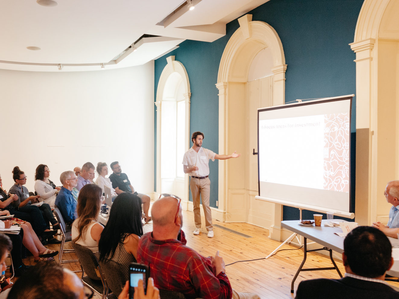 Ryan presenting to an audience