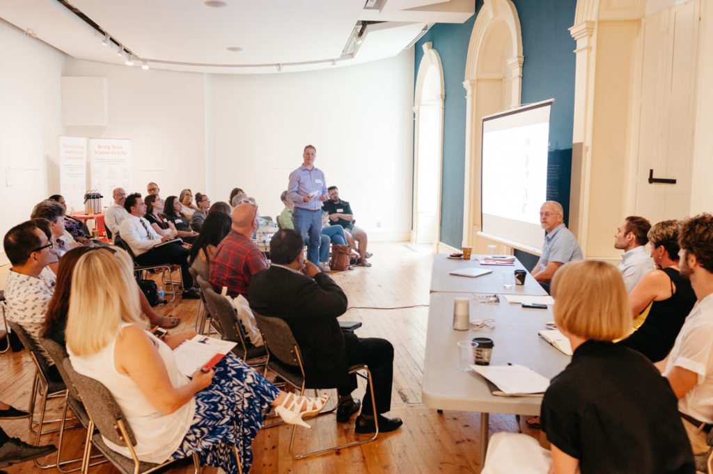 A large group at affordable housing presentation
